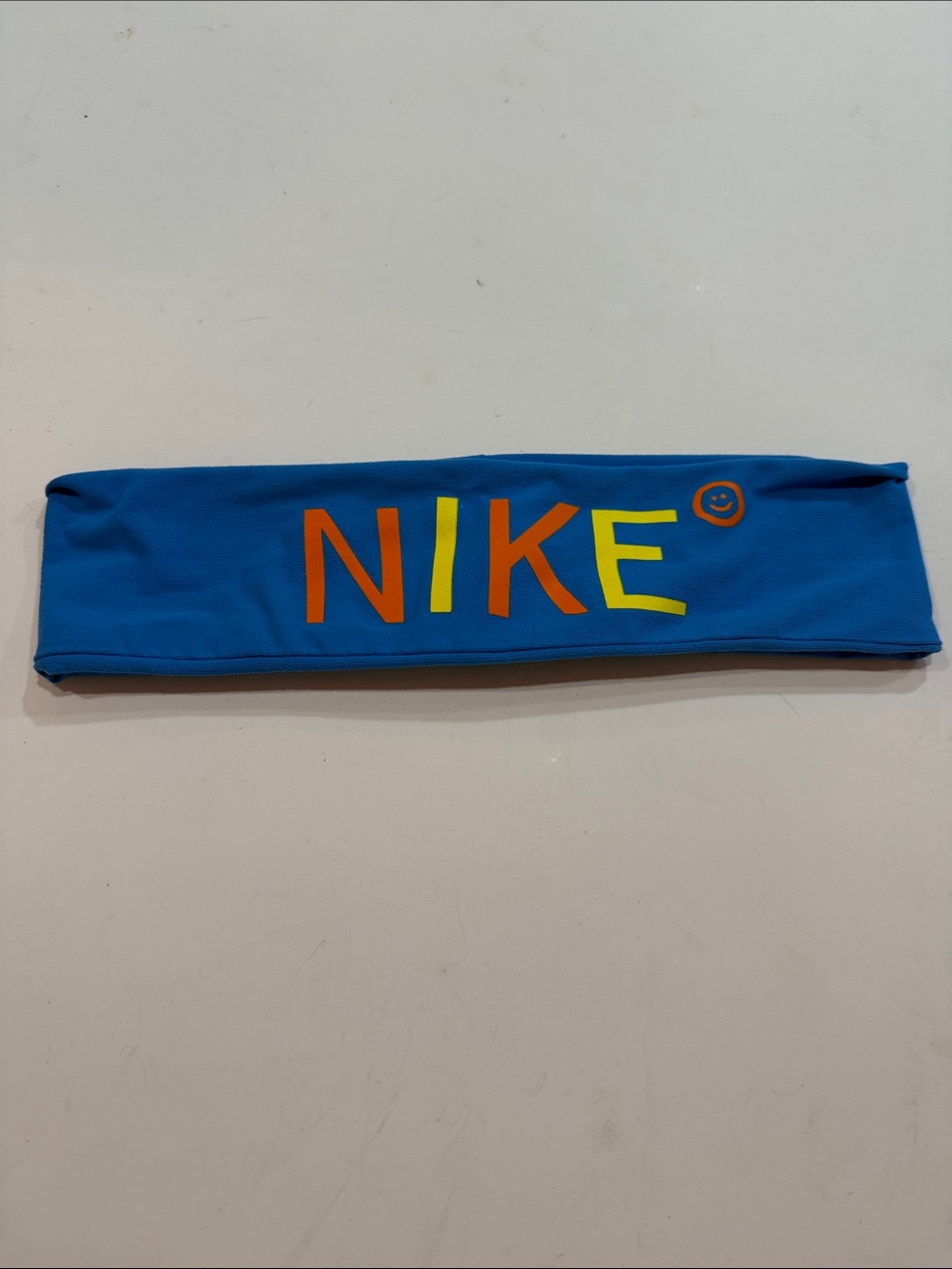 Nike Bright Blue Headband with Orange & Yellow Logo